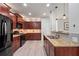 Well-equipped kitchen with stainless steel appliances, granite countertops, and ample cabinet space at 124 Freedom Dr, Acworth, GA 30102