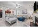 Stylish living area with a fireplace, an open layout, and an easy connection to the kitchen at 124 Freedom Dr, Acworth, GA 30102