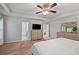 Comfortable main bedroom featuring neutral decor, soft lighting, and generous closet space at 124 Freedom Dr, Acworth, GA 30102