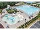 A large community pool with a slide, splash area, and plenty of seating in a well-maintained neighborhood at 124 Freedom Dr, Acworth, GA 30102