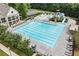 A large community pool with lap lanes, a slide, a clubhouse, and plenty of seating in a well-maintained neighborhood at 124 Freedom Dr, Acworth, GA 30102