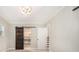Bedroom with decorative barn door leading to open closet at 1621 Northlake Springs Ct, Decatur, GA 30033