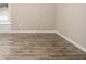 Bedroom with luxury vinyl flooring and neutral walls at 1621 Northlake Springs Ct, Decatur, GA 30033