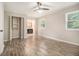 Bedroom featuring a ceiling fan, and a view of the bathroom and closet at 1621 Northlake Springs Ct, Decatur, GA 30033