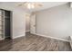 Bedroom with luxury vinyl flooring, ceiling fan and closet at 1621 Northlake Springs Ct, Decatur, GA 30033
