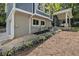 Exterior elevation of a home with a landscaped walkway at 1621 Northlake Springs Ct, Decatur, GA 30033