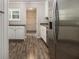 Kitchen featuring stainless steel appliances and granite counter-tops with backyard views at 1621 Northlake Springs Ct, Decatur, GA 30033