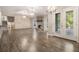 Spacious living room with stone fireplace, and hardwood floors leading to an outdoor space at 1621 Northlake Springs Ct, Decatur, GA 30033