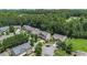 Aerial view of neighborhood featuring mature trees and lush landscaping at 1883 Jameson Cir, Lawrenceville, GA 30043