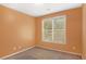 Bright bedroom with window, closet, and neutral walls, perfect for relaxation at 1883 Jameson Cir, Lawrenceville, GA 30043