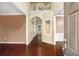 Spacious foyer features hardwood floors, a two-story ceiling, and decorative alcove at 1883 Jameson Cir, Lawrenceville, GA 30043
