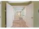 Upstairs hallway with carpet, and multiple archways with trim at 1883 Jameson Cir, Lawrenceville, GA 30043