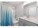 Cozy bathroom with a shower and bathtub combo, and a vanity at 3505 Aqua Point Pl, Cumming, GA 30041