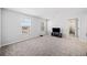 Spacious bedroom featuring neutral walls, carpet, and bright natural light at 3505 Aqua Point Pl, Cumming, GA 30041