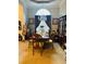 Elegant dining room featuring a chandelier, large window, and seating for six at 3545 Renaissance Cir, Atlanta, GA 30349
