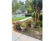 Well-manicured front yard with flower pots and a lush green lawn at 3545 Renaissance Cir, Atlanta, GA 30349