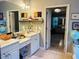 Bright bathroom with double vanities, tile floors and access to the main bedroom at 3545 Renaissance Cir, Atlanta, GA 30349