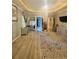 Main bedroom with a large rug and access to the en suite bathroom at 3545 Renaissance Cir, Atlanta, GA 30349