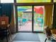 Bright and airy sunroom with a view of the beautiful patio and backyard, creating a serene atmosphere at 3545 Renaissance Cir, Atlanta, GA 30349