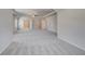 Spacious bonus room features a tray ceiling and multiple windows for ample natural light at 161 Haverling Pass, Hampton, GA 30228
