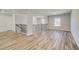 Bright hallway features wood floors, decorative lighting and decorative railing at 161 Haverling Pass, Hampton, GA 30228