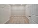 This walk-in closet provides ample storage space and carpeted floors at 161 Haverling Pass, Hampton, GA 30228