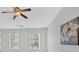 Bedroom featuring neutral walls, natural light, and a modern ceiling fan at 1795 Waterside Nw Dr, Kennesaw, GA 30152