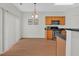 Eat-in kitchen with modern appliances, wood cabinets, and sliding glass door to backyard at 1795 Waterside Nw Dr, Kennesaw, GA 30152