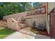 Outdoor space with access to an elevated wooden deck and backyard storage area at 450 Ledbetter Rd, Villa Rica, GA 30180