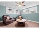 Finished basement features dual recliner chairs and built-in shelving at 450 Ledbetter Rd, Villa Rica, GA 30180