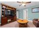 Spacious basement has a large entertainment center and comfortable seating at 450 Ledbetter Rd, Villa Rica, GA 30180