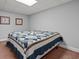 Basement bonus room with queen bed and carpet flooring at 450 Ledbetter Rd, Villa Rica, GA 30180