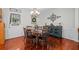 Cozy dining room with a wooden table and chairs under a chandelier at 450 Ledbetter Rd, Villa Rica, GA 30180