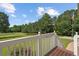 View from front porch of a well maintained lawn and scenic neighborhood street at 450 Ledbetter Rd, Villa Rica, GA 30180
