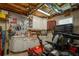 Well-equipped garage with built-in storage, workbench, and natural light at 450 Ledbetter Rd, Villa Rica, GA 30180