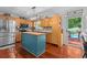 Kitchen features stainless steel appliances, wood cabinets, and an island with butcher block top at 450 Ledbetter Rd, Villa Rica, GA 30180
