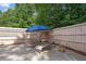 Secluded outdoor patio features lounge seating and privacy fencing, ideal for peaceful relaxation at 450 Ledbetter Rd, Villa Rica, GA 30180