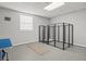 Multi-purpose room with dog kennels, neutral colors, and natural light from a window at 450 Ledbetter Rd, Villa Rica, GA 30180