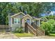 Charming home with stone accents, updated siding, and wooden shutters at 1788 Campbellton Sw Rd, Atlanta, GA 30311