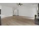 Spacious living room with modern flooring and ample natural light, perfect for entertaining at 8689 Cedar Creek Rdg, Riverdale, GA 30274