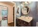 Stylish bathroom with a dark vanity and a mirror at 955 Juniper Ne St # 4127, Atlanta, GA 30309