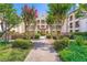 Beautiful exterior view of a charming building with lush landscaping at 955 Juniper Ne St # 4127, Atlanta, GA 30309