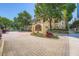The complex entrance features mature landscaping and a paved entry at 955 Juniper Ne St # 4127, Atlanta, GA 30309