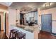 Kitchen area featuring a breakfast bar and modern appliances at 955 Juniper Ne St # 4127, Atlanta, GA 30309