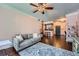 Comfortable living space with sofa, area rug, and a view into the kitchen at 955 Juniper Ne St # 4127, Atlanta, GA 30309