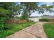 Backyard and detached garage with driveway at 10 Shadburn Ferry Rd, Buford, GA 30518