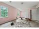 Bedroom with light pink walls, closet, carpet, and a window with a view at 10 Shadburn Ferry Rd, Buford, GA 30518