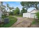 Long driveway leading to detached garage at 10 Shadburn Ferry Rd, Buford, GA 30518