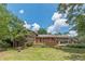 Large backyard with a deck and in-ground pool, great for summer fun at 1737 Fontaine Dr, Jonesboro, GA 30236