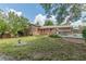 View of the backyard with a deck and an in-ground swimming pool at 1737 Fontaine Dr, Jonesboro, GA 30236